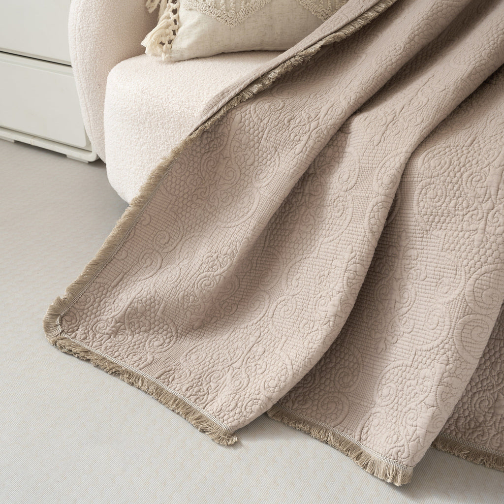DaDa Bedding Elegant Fringed Cotton Quilted Throw Blanket - Luxurious Solid Soft Paisley Pattern, Cozy Lightweight Lap Throw, Perfect for Couch or Bed, Neutral Sandy Taupe Tan Beige, 50x60 Inches